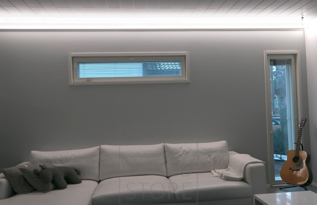 Ceiling mounted led strip creating beautiful indirect light in your living room.